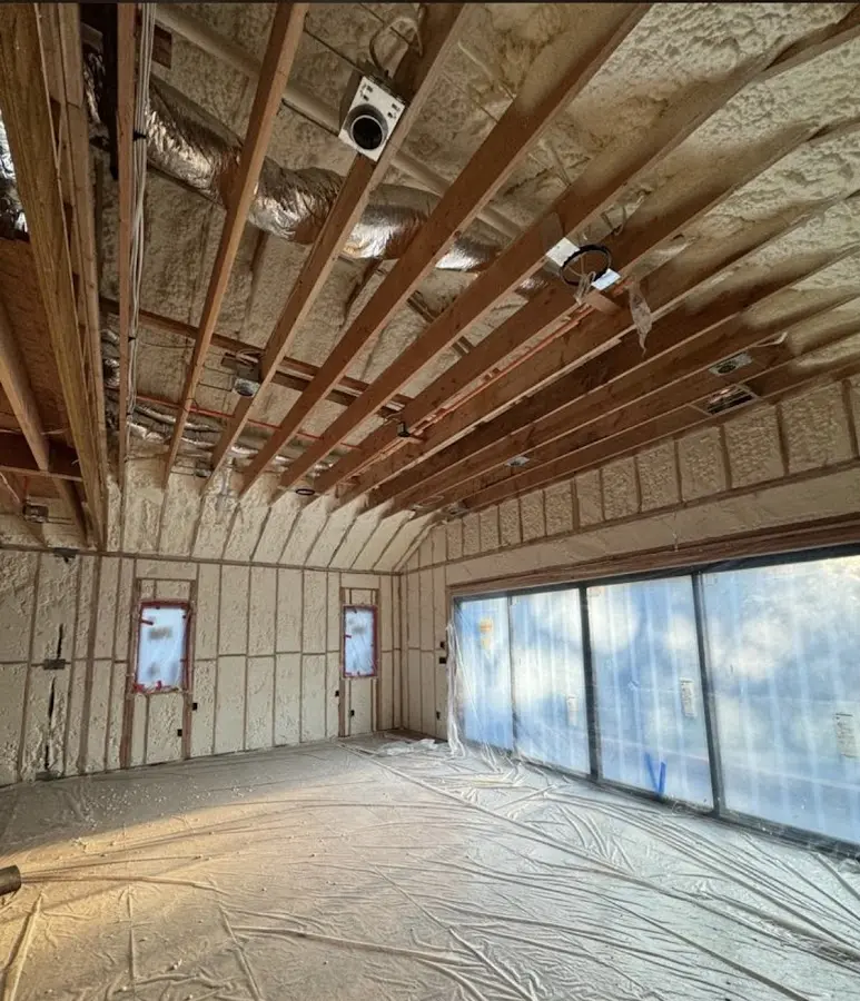 Interior walls and ceiling insulated with spray foam during new construction in Ozark